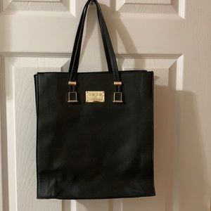 Bebe 2 piece black & gold bag set